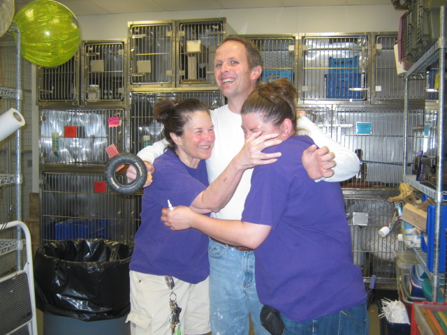 Hugs for Annie, Aaron, and Katy. (It looks like Katy is smiling but it's hard to be sure).